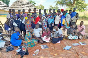Students Writing Letters to Their Sponsors