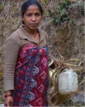 Nepalese woman at the spring