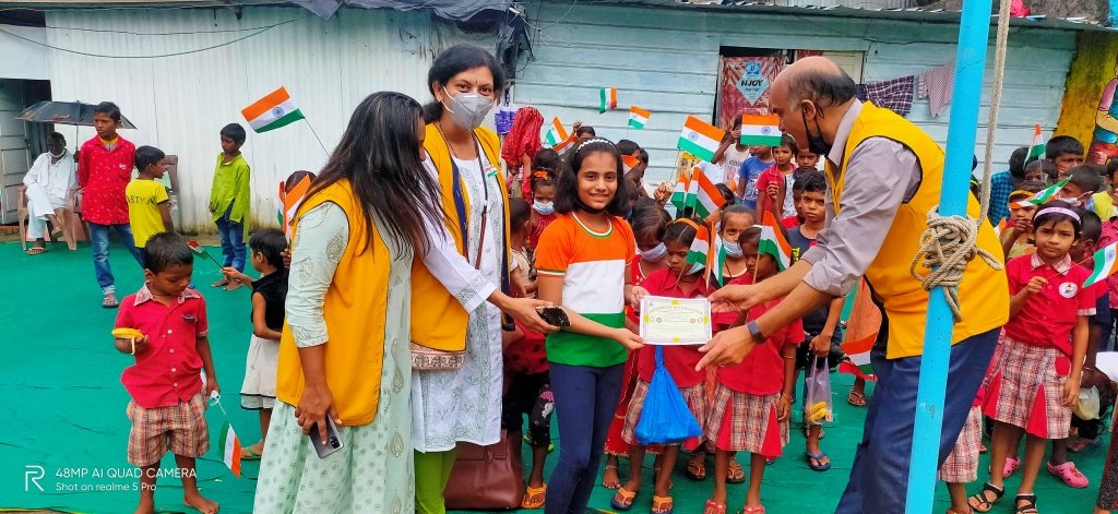 Child Ananya given a certificate of Appreciation