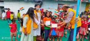 Child Ananya given a certificate of Appreciation