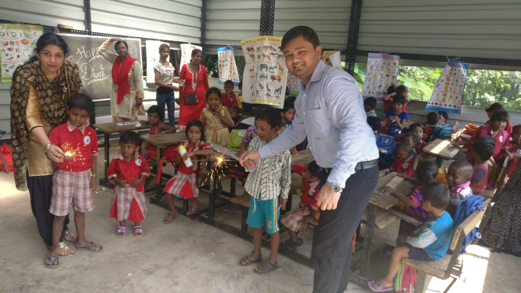 Playing Diwali Color Sparklers with bank officials