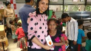 Lady Dr (surgeon) donating Books for our Library