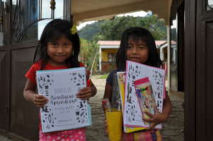 Britany & Aylin receiving their Adventure Journals
