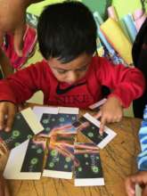 Carlos working on a puzzle about our immune system
