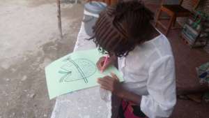 A young girl drawing