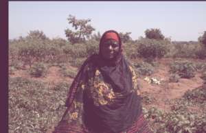 A farmer from Iguguno in her Forest Garden