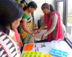 umeed women learning to make candles