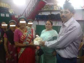 Ration distribution for Umeed beneficiaries.