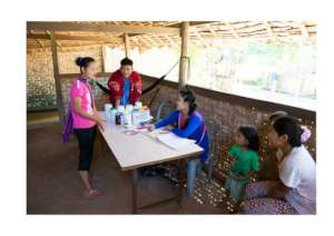 Health workers meet community members