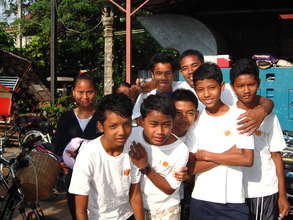 Young adults preparing for a training ride