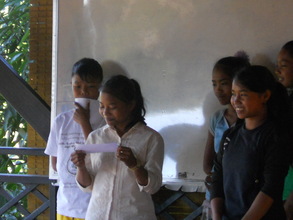 Some of the girls taking a turn to present