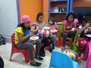 Girls eating their cake