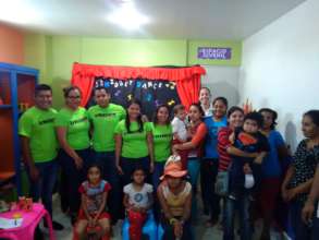 UNIDEPs friends with childs in the teather day