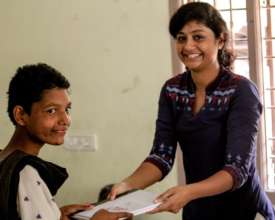 Nandhini is presented with new books