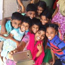 Young children take a selfie!