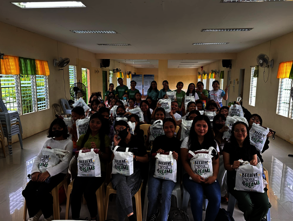 Girls receive Move for Equity packs with tools