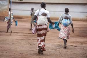 Women walk home with DfG Kits after training