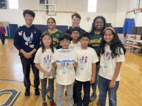 FLL Team celebrates at a Festival.