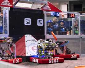 Robot scoring a note during the autonomous phase