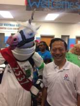 FIRST Chesapeake Board member with a Team mascot