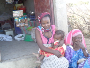 Mihret with one of her children and mother