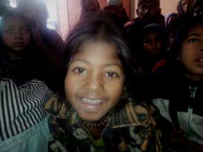 A smile of Najma on got warm clothes