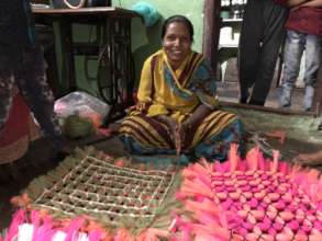 Varsha with her mats