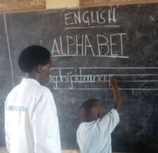 Practising the alphabet with Teacher Josephine