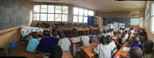 Teacher Josephine with her Primary 1 pupils