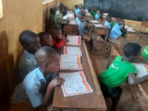 Each pupil with a book to follow the lesson