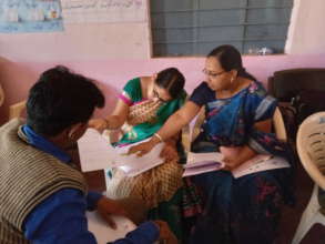 Teachers designing lesson plans.