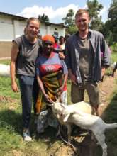 Kyaninga Dairy team with Mary and her goats
