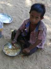 rescued children providing mid day meal