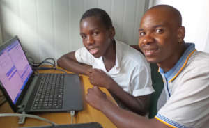 Net Fundi Alfred Teaching a New Net Buddy Mentee