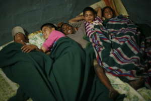 Kids sleeping in the shelter