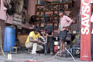 Children being trained in metal work