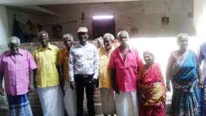 A group of beneficiaries receiving