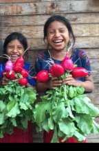 Girls learn to raise vegetables to eat and to sell