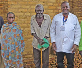 Senior citizens with doctor