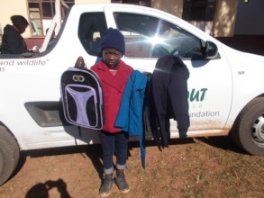 Primary school child with her new uniform
