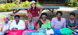 microfinance ladies showing off their products