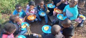 NCP children enjoying their morning meal