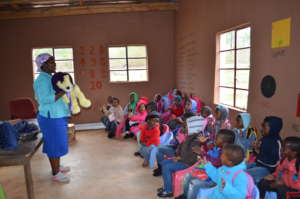 Teacher Mgazi with Frank the lion