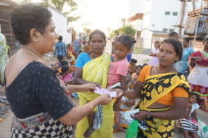 Rs.1000 distributed to 100 families