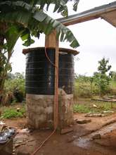 Repaired water tank in place and connected