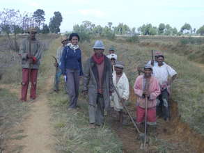 on the field with local people in Antsirabe