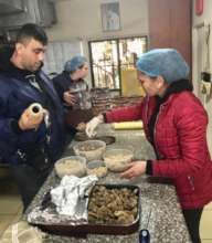 Staff preparing meals