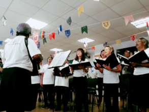 Teacher Leading the Choir