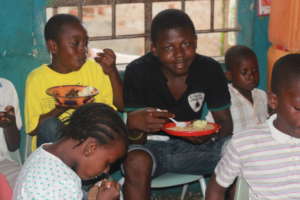 Dream Home children enjoying a meal