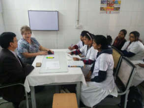 Valerie Loftin, RNCS, leads training.